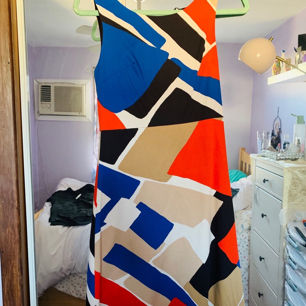 The limited dress never worn. Perfect condition.
